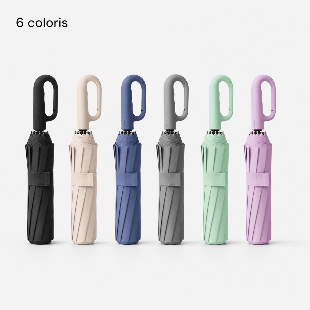Six parapluies Tokyo™ pliés en rang : noir, beige, bleu, gris, menthe et lilas.